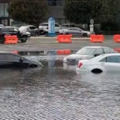 WATCH New Jersey Residents Begin Dumping Unwanted Cars In The Path Of Rising Floodwaters
